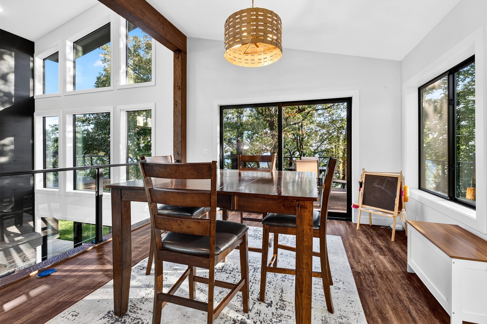 The dining area, glass on two sides.
