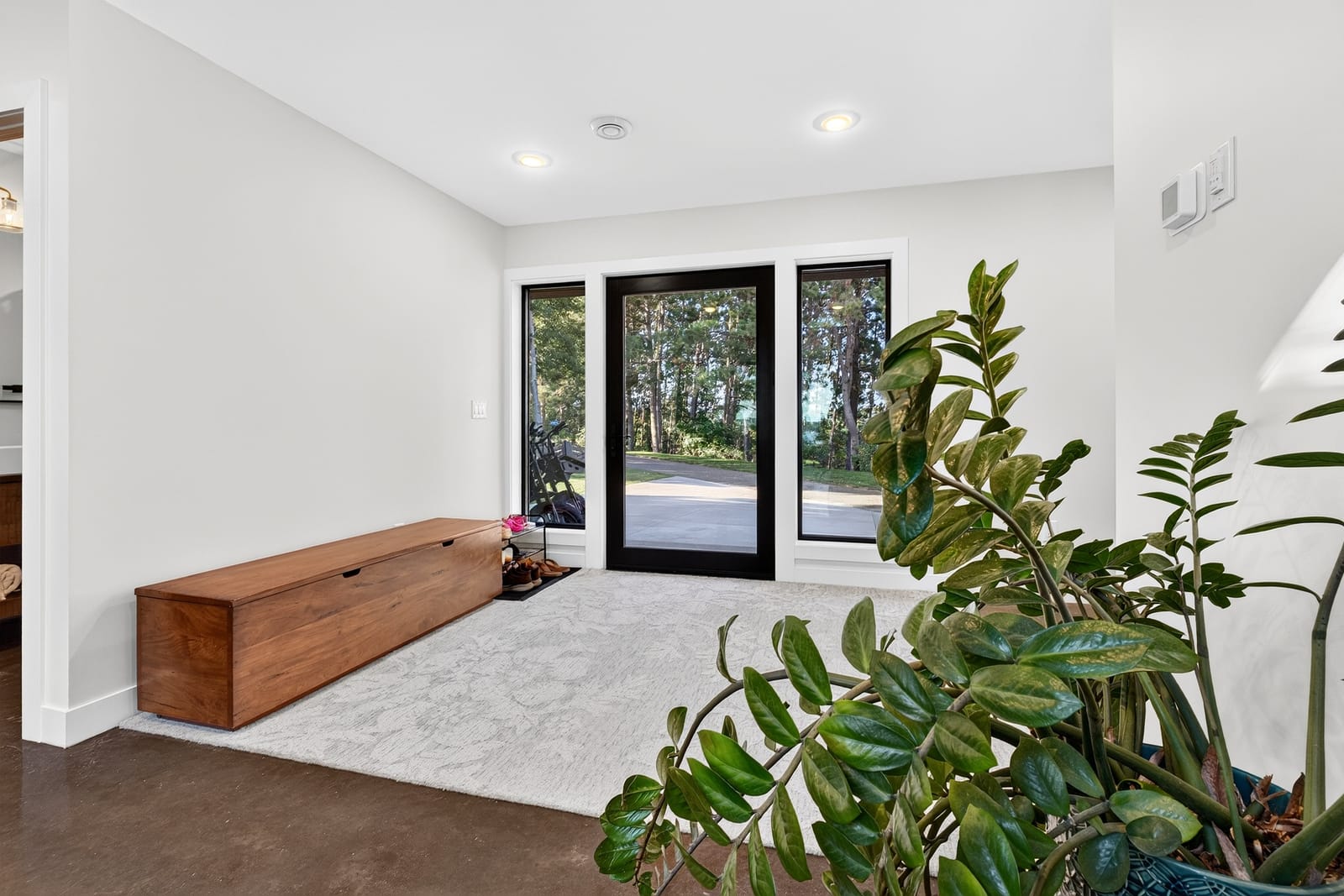 A flexible room off the entry, doors to the front lawn.