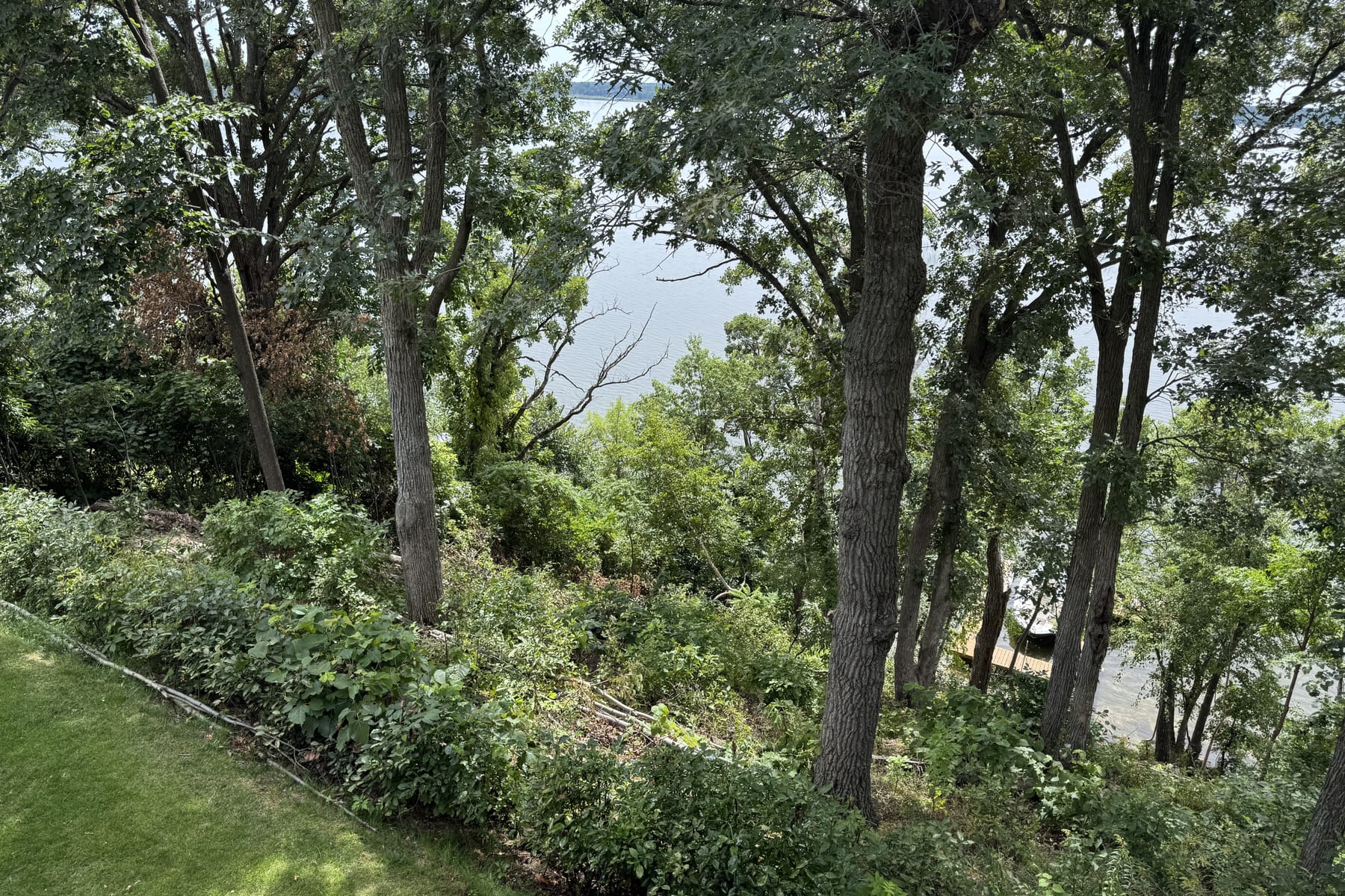 The house seen from the water, showing its 62 feet of elevation above Gull Lake.